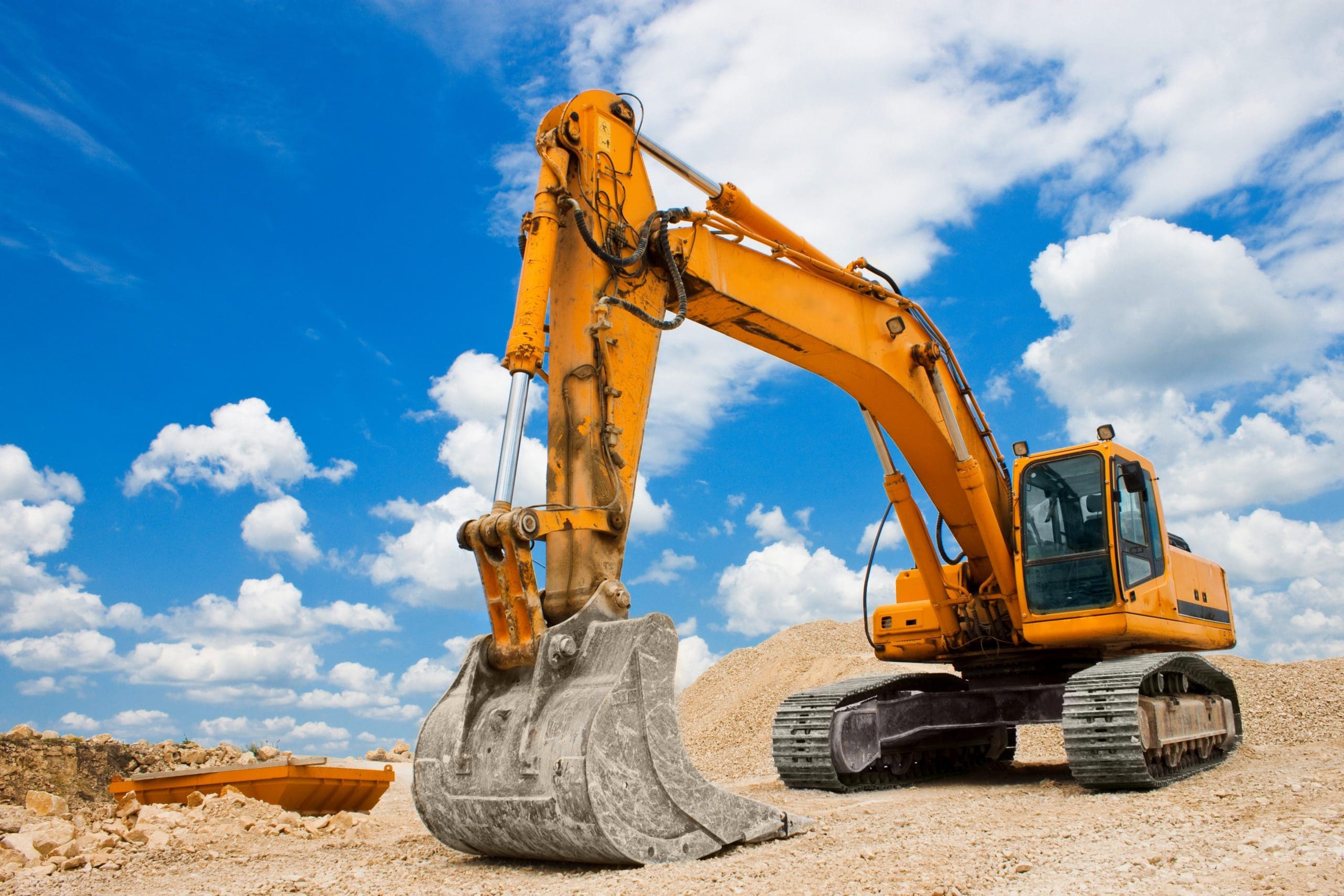 Yellow Excavator plant machinery at a Construction Site
