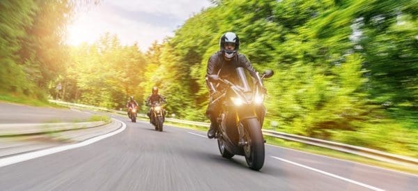three motorbikers on the road